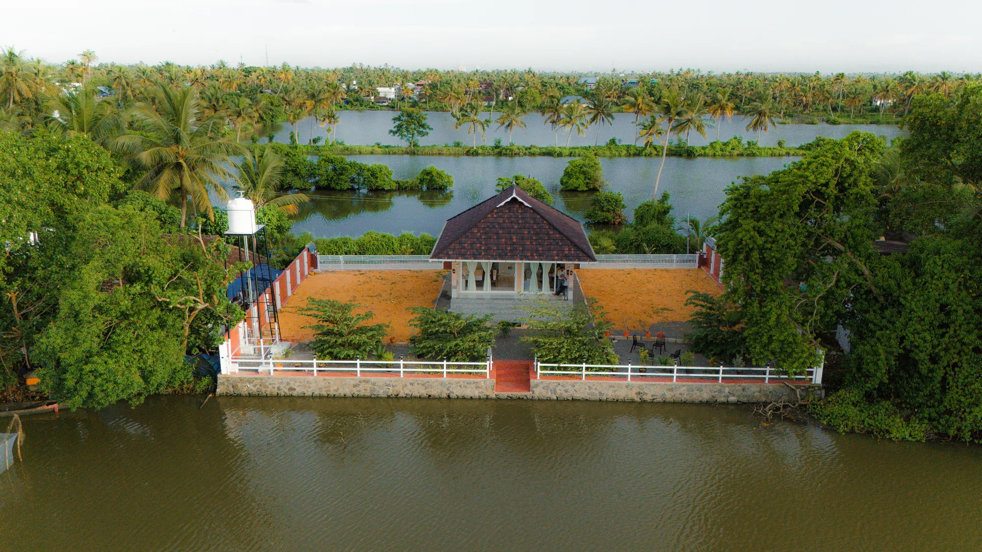 Serene backwaters of Kerala with palms
